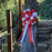 red and white wedding bow on a tree