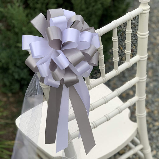 white-silver-wedding-pew-bows