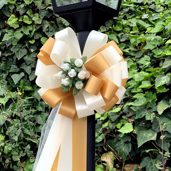 gold-ivory-wedding-pew-bows