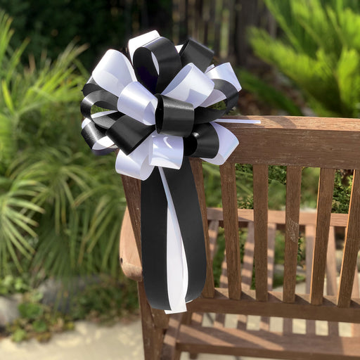 black-white-wedding-pew-bows